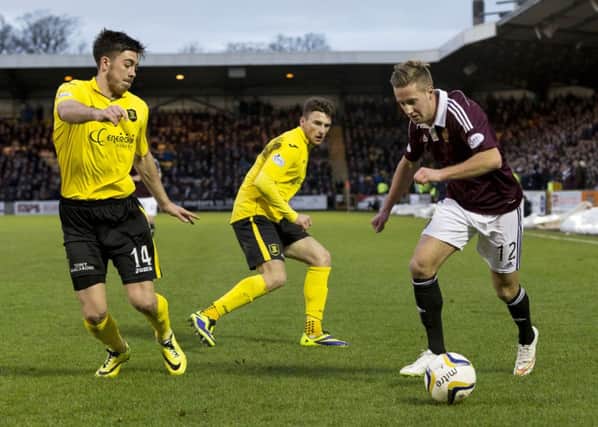 Winger Billy King gets behind the Livingston defence as Hearts increased their lead at the top of the Championship. Picture: SNS