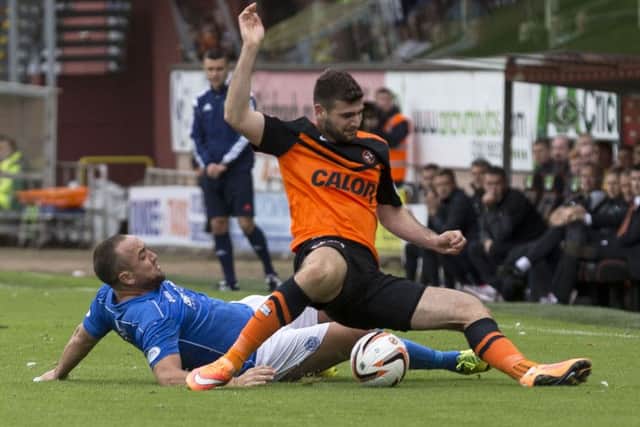 Dundee United's Nadir Ciftci is felled by St Johnstone's Lee Croft during the recent meeting between the two sides. Picture: SNS