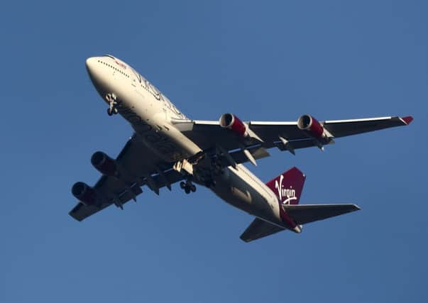 Virgin Atlantic flight VS43 pictured circling over Gatwick. Picture: Getty