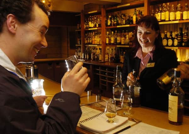 Buying a dram. Picture: TSPL