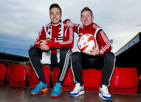 Andrew Considine, left, and Jonny Hayes have added to the feelgood factor at Aberdeen. Picture: SNS