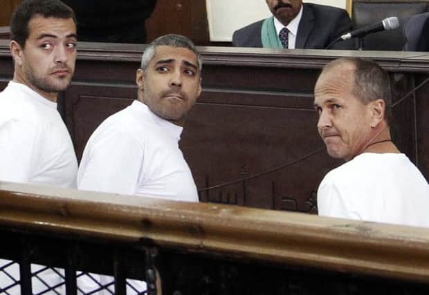From left, Baher Mohammed, Mohammed Fahmy and Peter Greste. Picture: AP