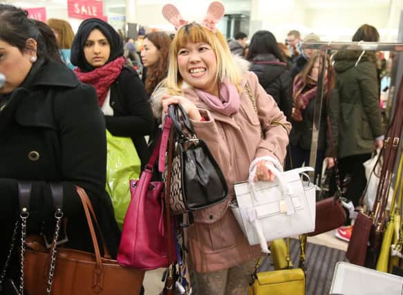Bargain hunters in Edinburgh in the Boxing Day sales. Picture: PA