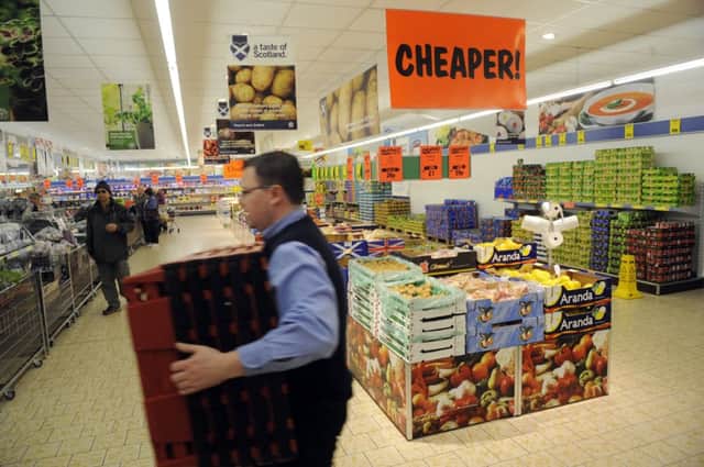 Pressure on the big four supermarkets from discounters like Lidl, above, has put the sector into deflation. Picture: Greg Macvean