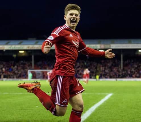 Cammy Smith sealed a 2-0 win over St Johnstone and took Aberdeen top of the Premiership. Picture: Bill Murray/SNS