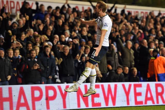 Tottenham striker Harry Kane celebrates after scoring the first of his two goals last night. Picture: Getty