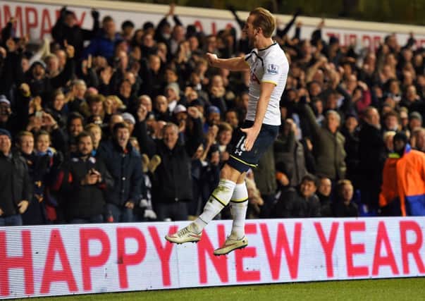 Tottenham striker Harry Kane celebrates after scoring the first of his two goals last night. Picture: Getty