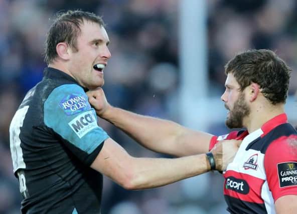 Al Kellock and Ross Ford square up in the first leg at Scotstoun. Picture: Robert Perry