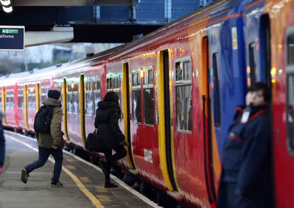 Passengers run to board train as increased rail fares averaging 2.5 per cent comes into effect today. Picture: Getty