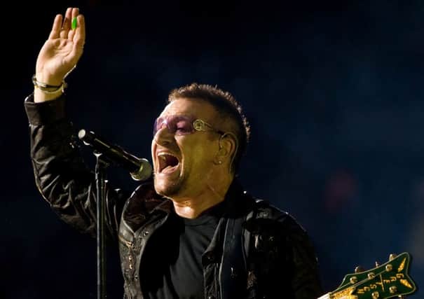 Bono injured his hand, shoulder, elbow and face after falling off his bicycle in New York. Picture: AFP