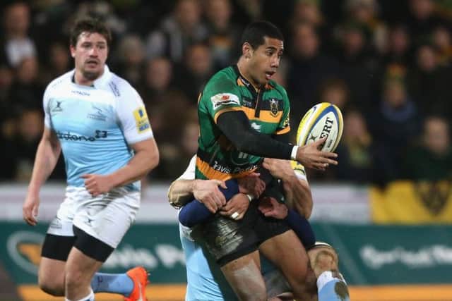 Ken Pisi of Northampton off loads the ball during last nights high-scoring Aviva Premiership match. Picture: David Rogers/Getty