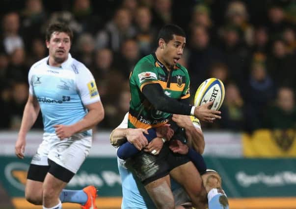 Ken Pisi of Northampton off loads the ball during last nights high-scoring Aviva Premiership match. Picture: David Rogers/Getty