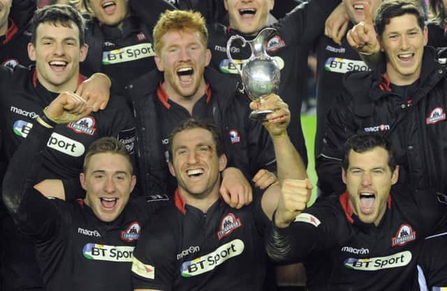 Mike Conman and Edinburgh celebrate with the trophy. Picture:

 Neil Hanna