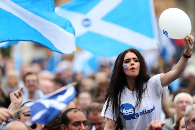 Referendum excitement at its peak as Yes supporters gathered in George Square, to the bewilderment of many No voters. Picture: PA