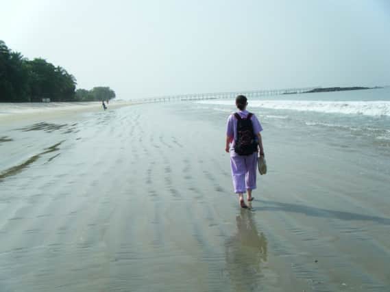 Pauline Cafferkey walks to work in Sierra Leone
