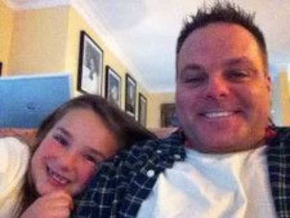 Marty Gutzler and his daughter Piper, left, who died in the crash