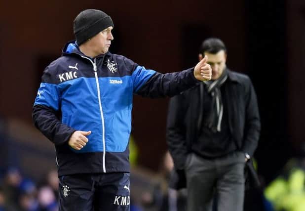 Rangers interim manager Kenny McDowall gives the thumbs up from the dugout. Picture: SNS