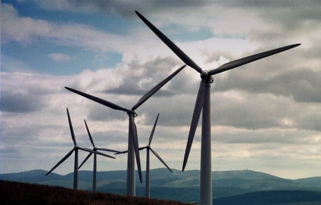 Windfarms like this one in Lanarkshire have been producing electricity for Scotland since 1996. Picture: Allan Milligan