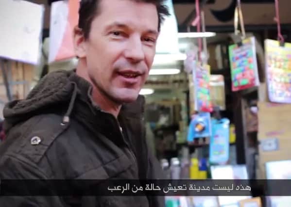 John Cantlie tours Mosul and visits a market, a hospital and police station in a propaganda video released by the Islamic State. Picture: PA