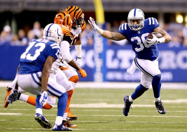 Daniel Herron of the Indianapolis Colts carries the ball against the Cincinnati Bengals. Picture: Getty Images