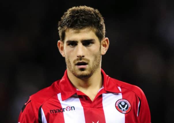 Ched Evans: Oldham deal reports. Picture: PA