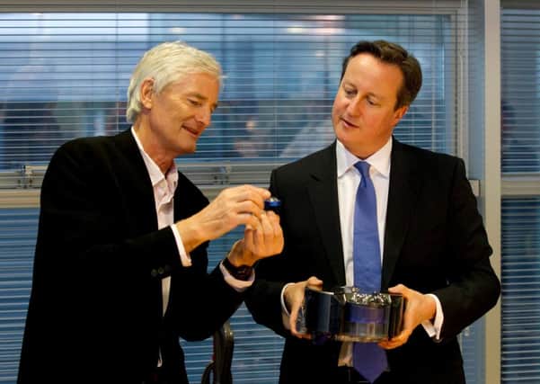 Sir James Dyson (left) with Prime Minister David Cameron. Picture: PA