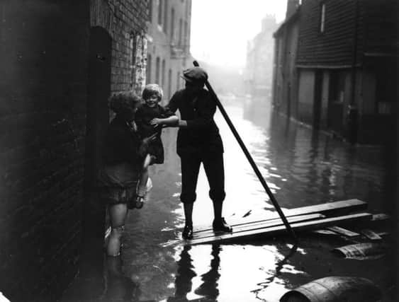 On this day in 1928 the River Thames overflowed, drowning 14 people living in basement homes in London. Picture: Getty