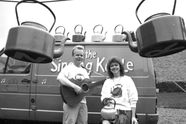 Scottish children's entertainers Artie Trezise and Cilla Fisher, founders of The Singing Kettle show, beside the van in January 1989. Picture: TSPL
