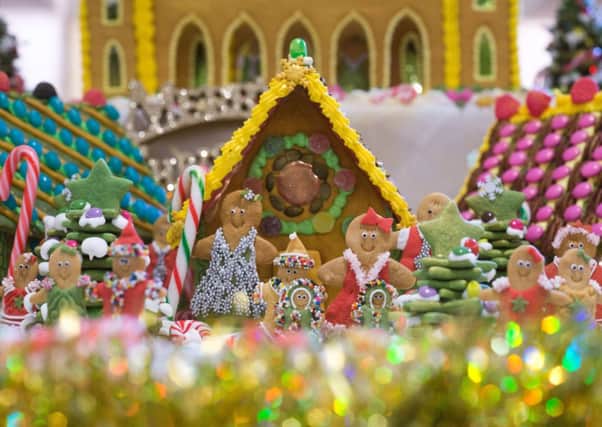 A gingerbread village like the one pictured, a tartan bikini and a case full of whisky were among items found. Picture: TSPL