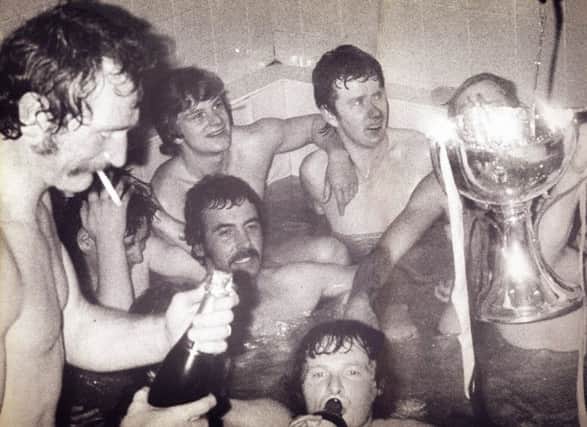 Davie Robb celebrates Aberdeens 1976 League Cup success with a cigarette and champagne