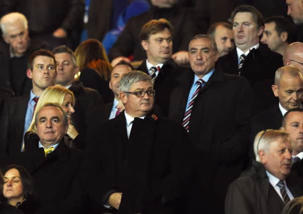 Derek Llambias, bottom left, met Neil Doncaster yesterday as the SPF chief sought assurances over Rangers' financial position. Picture: SNS