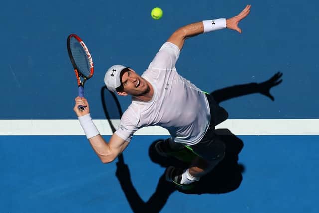 Andy Murray serves in his match against Jerzy Janowicz. Winning nine games in a row proved decisive for the Scot. Picture: Getty