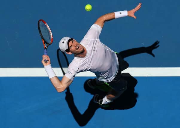 Andy Murray serves in his match against Jerzy Janowicz. Winning nine games in a row proved decisive for the Scot. Picture: Getty