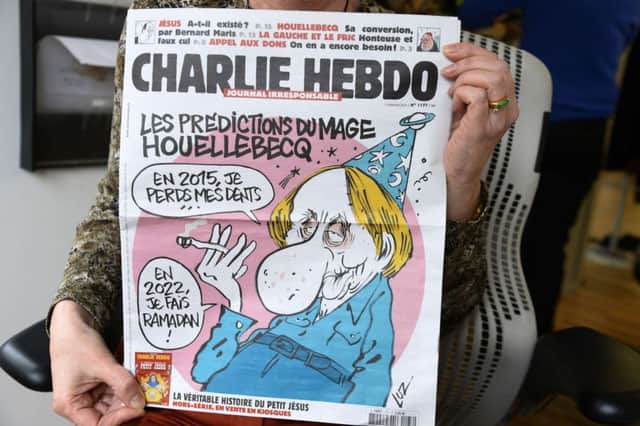 The current issue mocks author Michel Houellebecq. Picture: Getty
