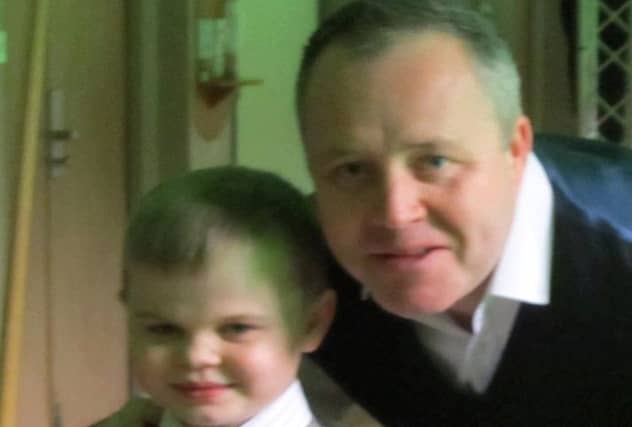Collum Coffey, left, with former snooker world champion John Higgins. Picture: PA