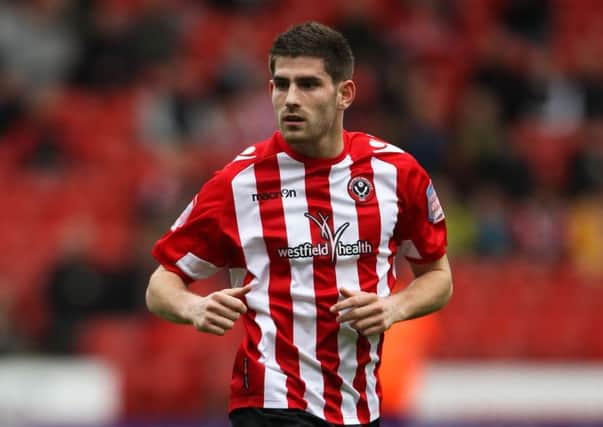 Ched Evans could be an Oldham player this week. Picture: PA
