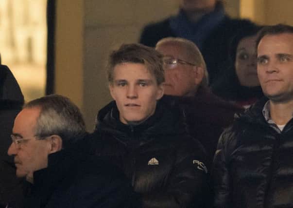Martin Odegaard in the stands for the match between Atletico and Real Madrid. Picture: Getty
