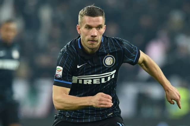 Lukas Podolski or Xherdan Shaqiri - but not both - will face Celtic. Picture: Getty
