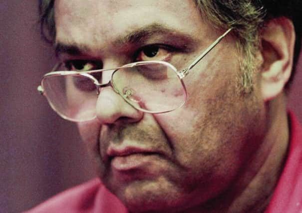 Former British millionaire Krishna Maharaj listens to proceedings during a week-long hearing at Metro-Dade Courthouse in Miami in 1997. Picture: AP