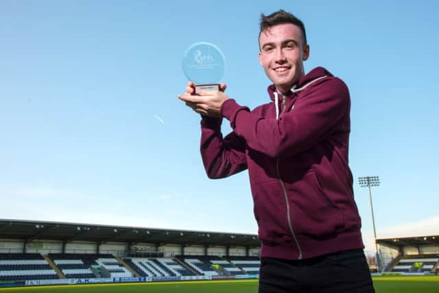 St Mirren's Stevie Mallan shows off his Young Player of the Month Award for December. Picture: SNS
