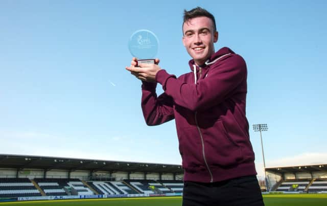 St Mirren's Stevie Mallan shows off his Young Player of the Month Award for December. Picture: SNS