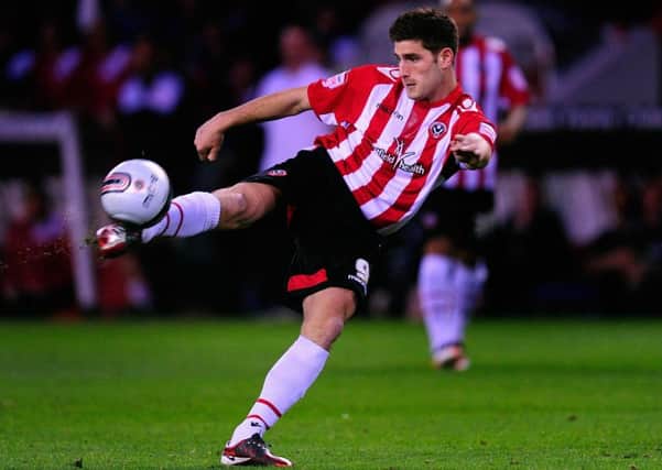 Ched Evans, left, wants to return to football while hoping to clear his name. Picture: Allsport