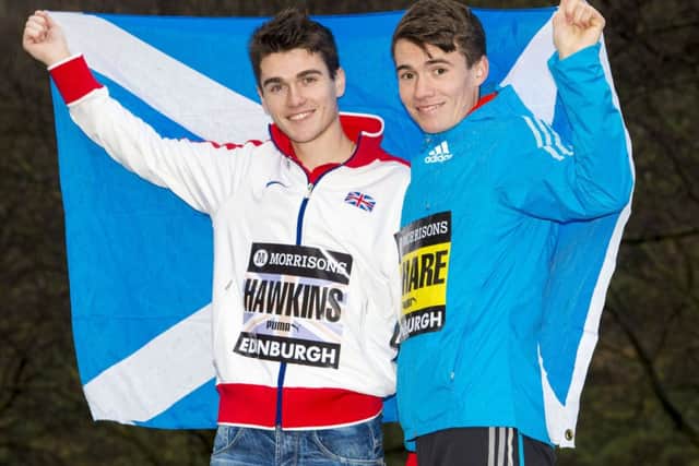 Callum Hawkins, left, and Chris OHare meet up yesterday ahead of the Great Edinburgh XC. Picture: PA