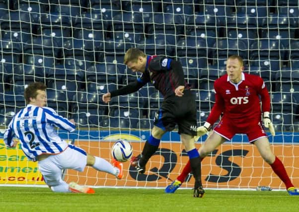 Inverness' Billy Mckay (left) fires the ball into the net to score for his side. Picture: SNS Group