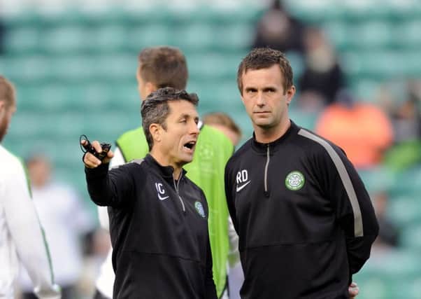 John Collins and Ronnie Deila are targeting more Scots in the squad at Celtic. Picture: John Devlin