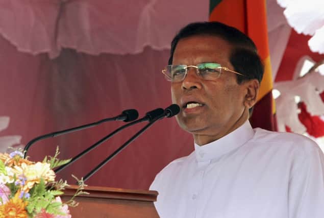 Sri Lankas new President Maithripala Sirisena addresses the nation outside the Temple of Tooth in Kandy, Sri Lanka. Picture: AP