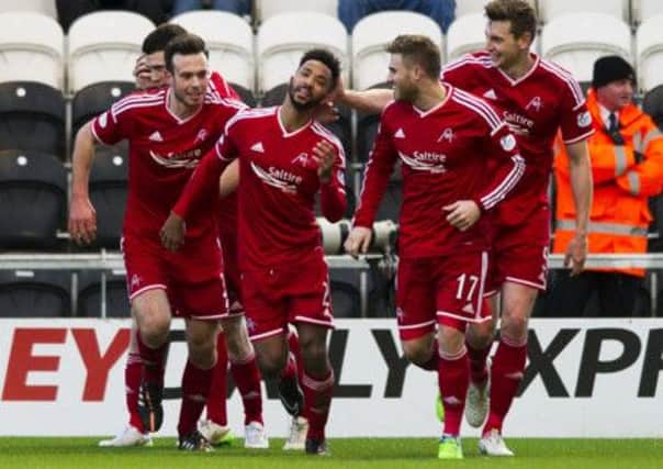Plaudits for Shay Logan after he secured Aberdeen's victory over St Mirren. Picture: SNS