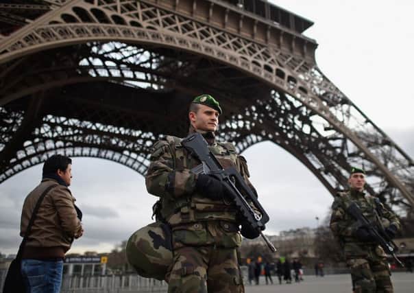 French troops patrol around the Eifel Tower on January 12, 2015 in Paris, France. Picture: Getty