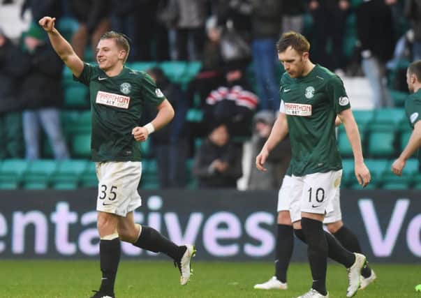 Hibernian's Jason Cummings celebrates after putting his side 3-1 up. Picture: SNS
