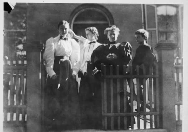 Thomas Stearns Eliot, aged 7, sitting with his mother and from left, cousin Henrietta and sisters Marian (obscured) and Margaret at the family home at 2635 Locust Street, St Louis, the morning after the 1896 cyclone.